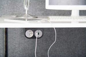 Phase socket unit integrated into desk