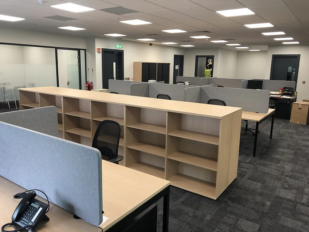 open plan area divided with Bookcases