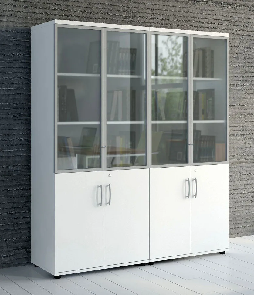 two tall bookcases with doors