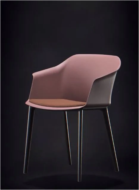 Aran tube chair with powder pink shell, brown upholstered seat and black legs