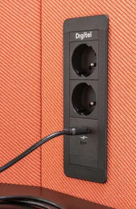 Coda acoustic booth power sockets and USB charging port close-up