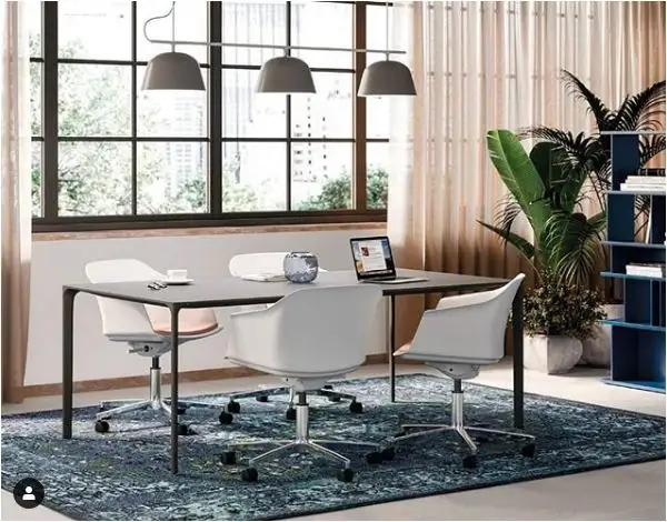 white aran swivel chairs in office